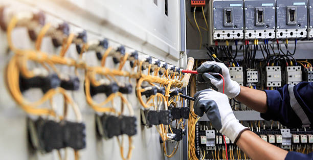 Professional Electrician technician working in Alamo, TX